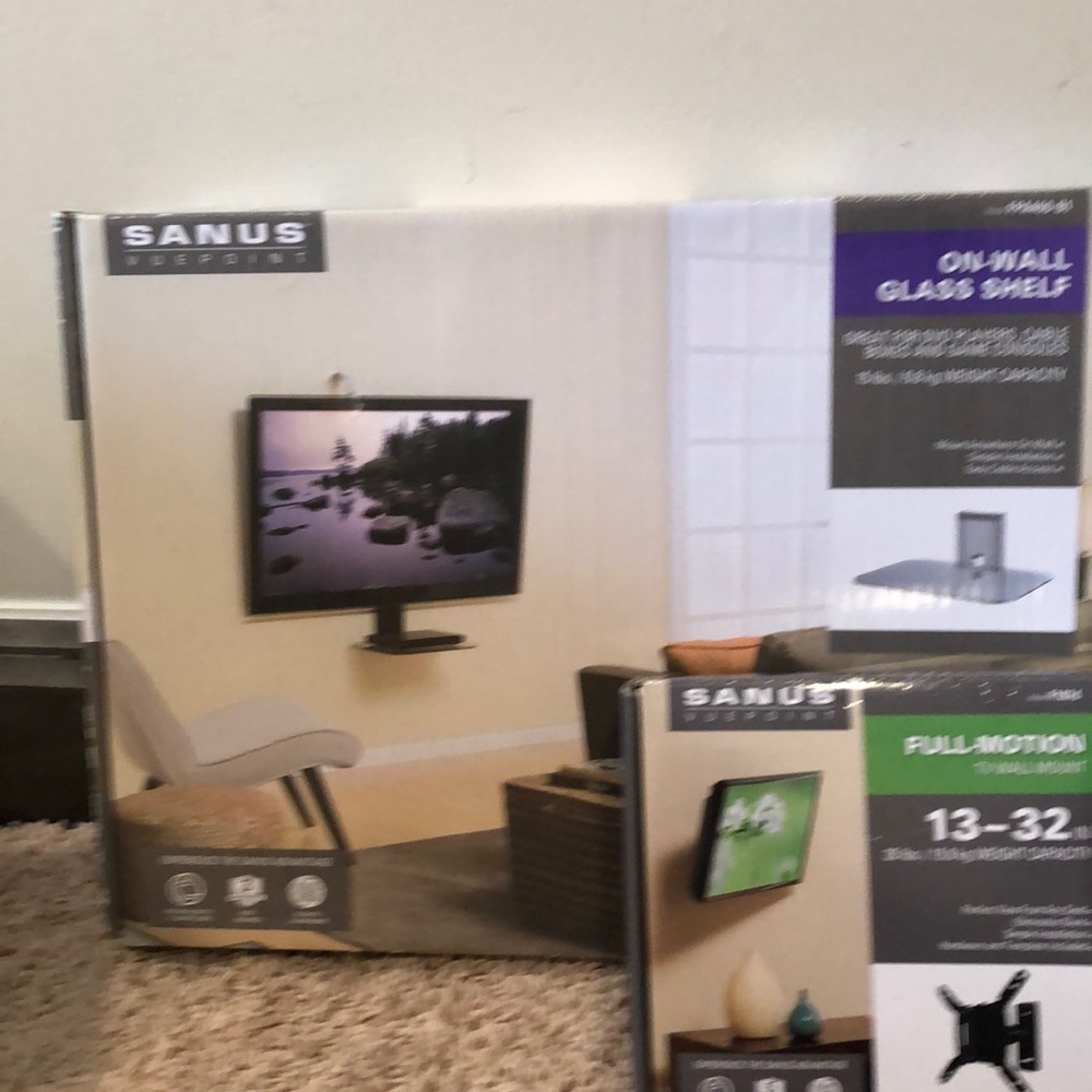 Tv wall mount and glass shelf never used